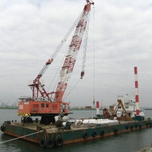 南本牧ふ頭第5ブロック廃棄物最終処分場（仮称）建設工事（その36・裏込工）